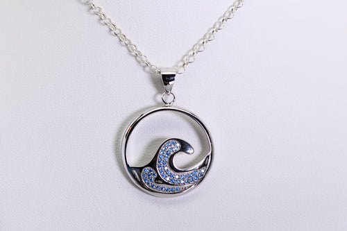 Sterling and blue topaz wave pendant