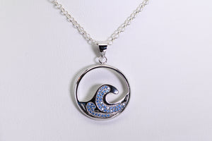 Sterling and blue topaz wave pendant