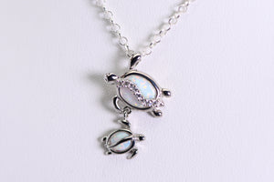 Sterling and opal double turtle pendant