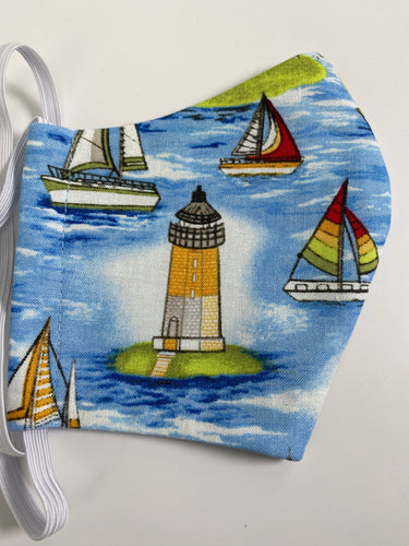 Lighthouses and Sailboats face mask