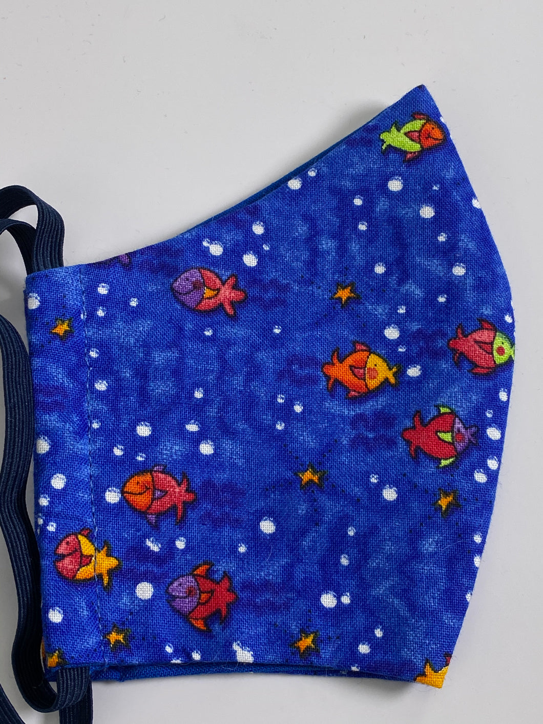 Little fish on blue face mask